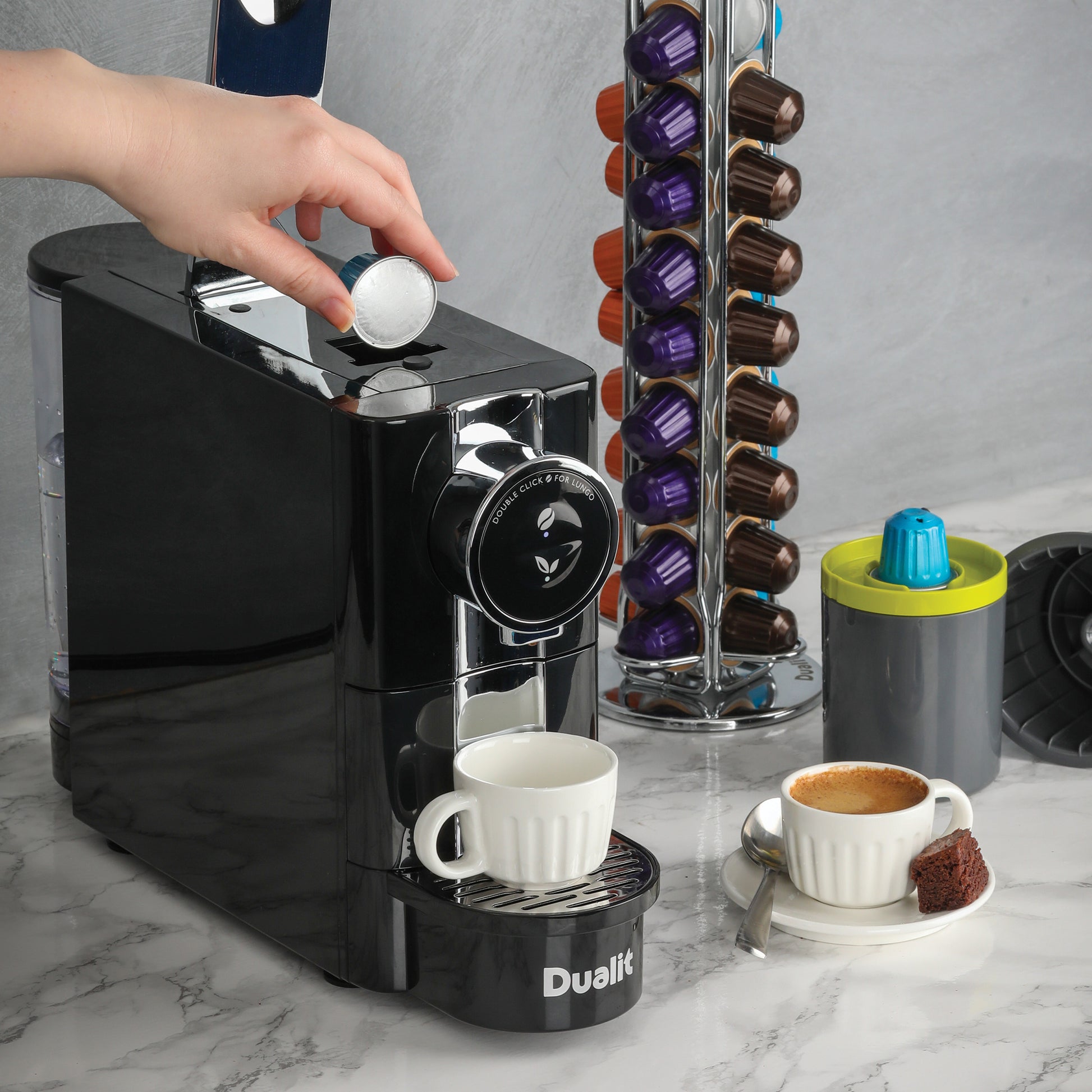 Dualit cafe plus being used on kitchen counter