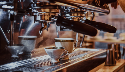commercial coffee machine pictured up close making a coffee
