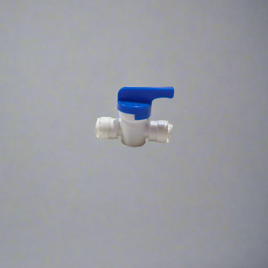 Metal fitting on a white surface with a blurred background
